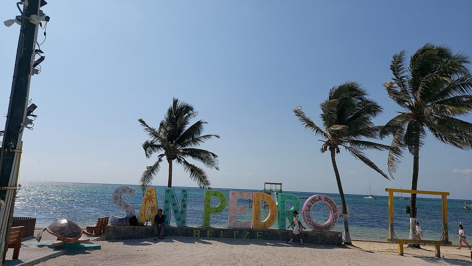 Investing in Belize as a Foreigner 2026 &mdash; Costs, Title and Residency Rules